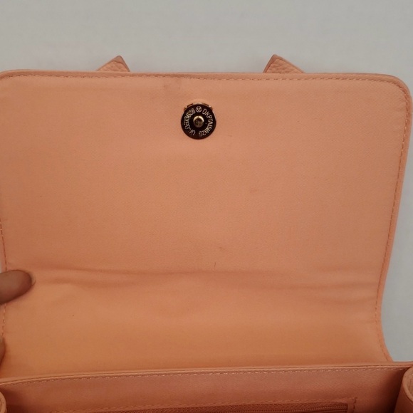 Elegant Peach Crossbody Bag with Bow Accent
NWOT - Picture 7 of 7